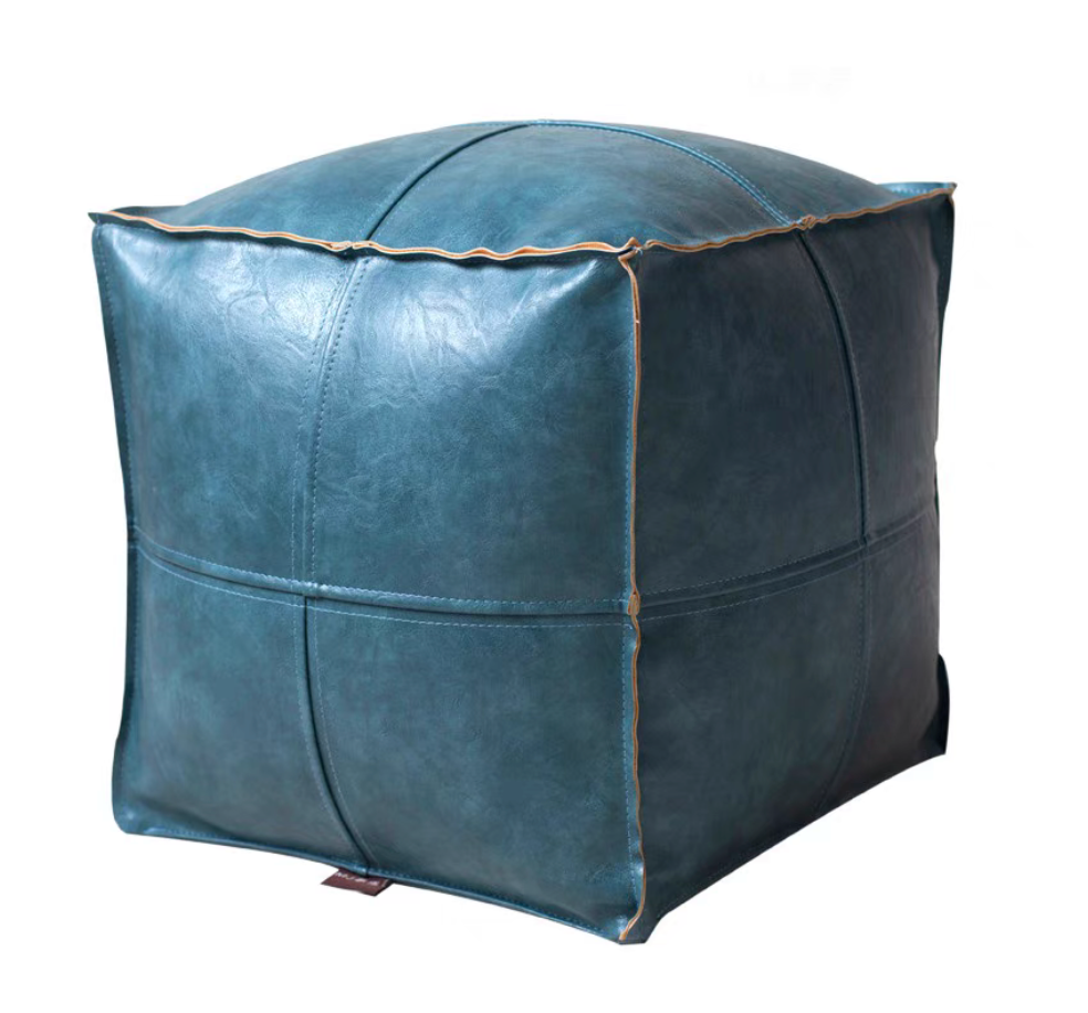 Lake blue faux leather square floor pouf with clean stitching shown in single product view