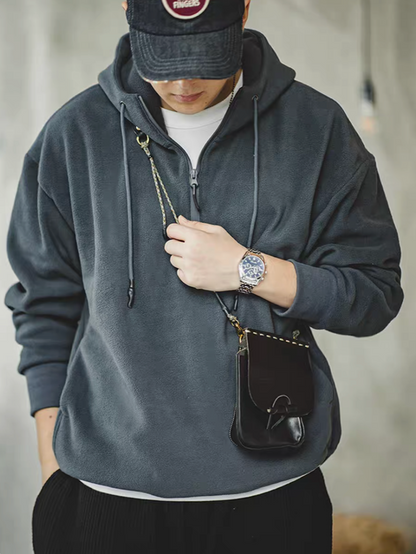 Vintage Half-Zip Fleece Hoodie in Slate Gray worn by model, front view showing relaxed fit, half-zip closure and soft fleece fabric
