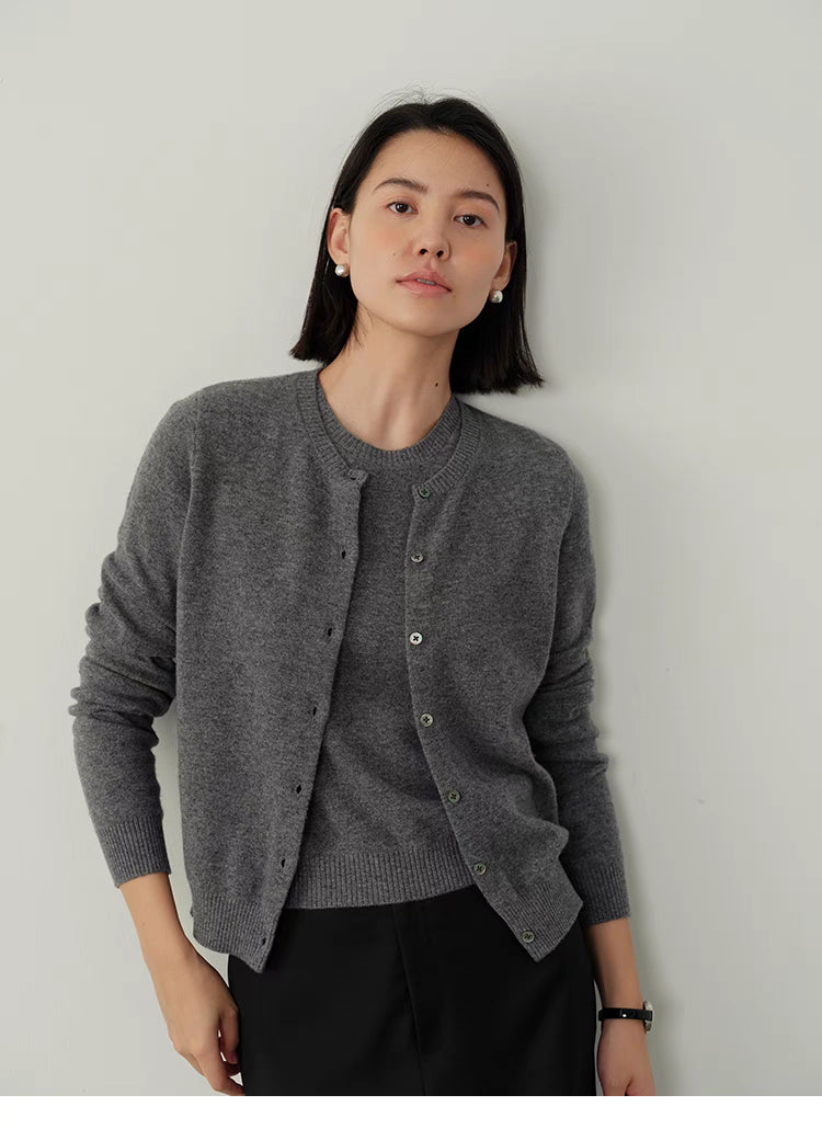 Vintage-Inspired Wool Cardigan in gray, front view on model, classic crewneck button design with soft wool fabric