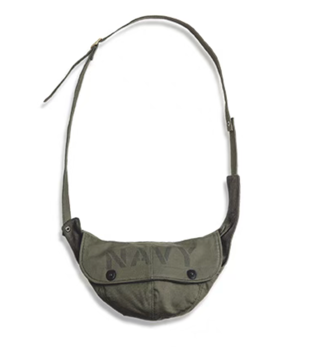 Vintage Military Canvas Sling Bag military green front view with flap closure and adjustable strap