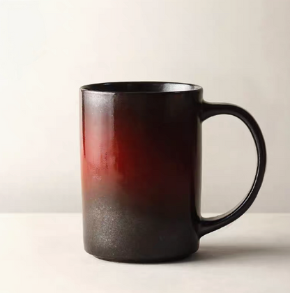 Dark red vintage rustic ceramic mug with deep gradient glaze transitioning to dark base in single product view