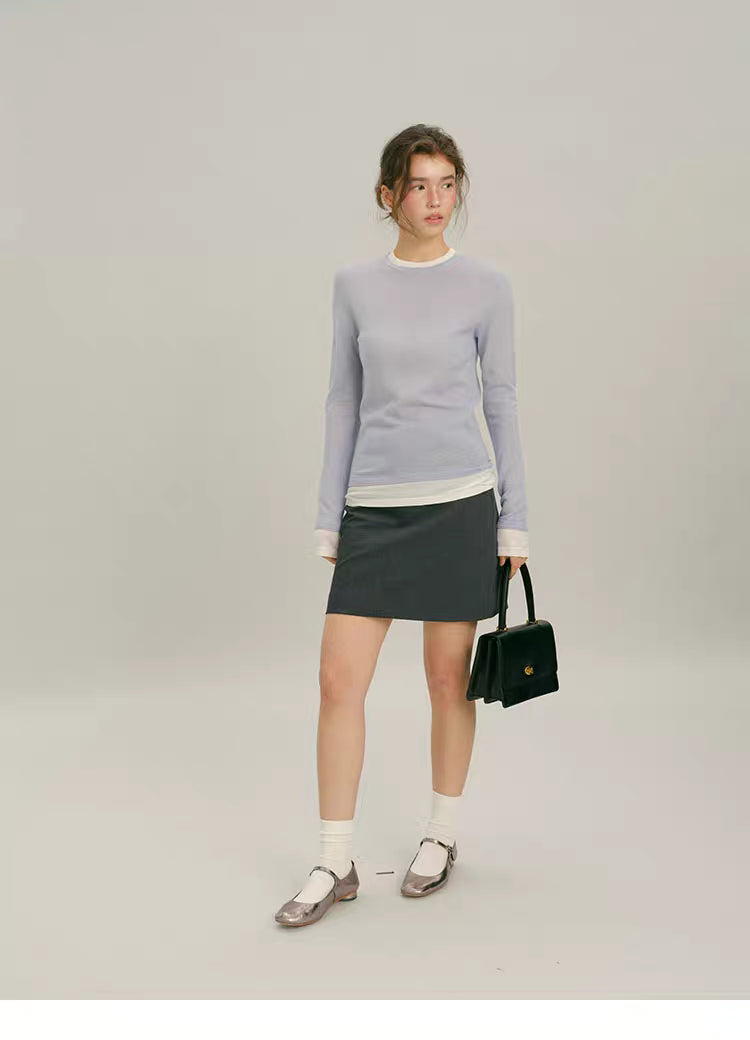 Full-body outfit view of Dusty Blue lightweight wool layered top with skirt