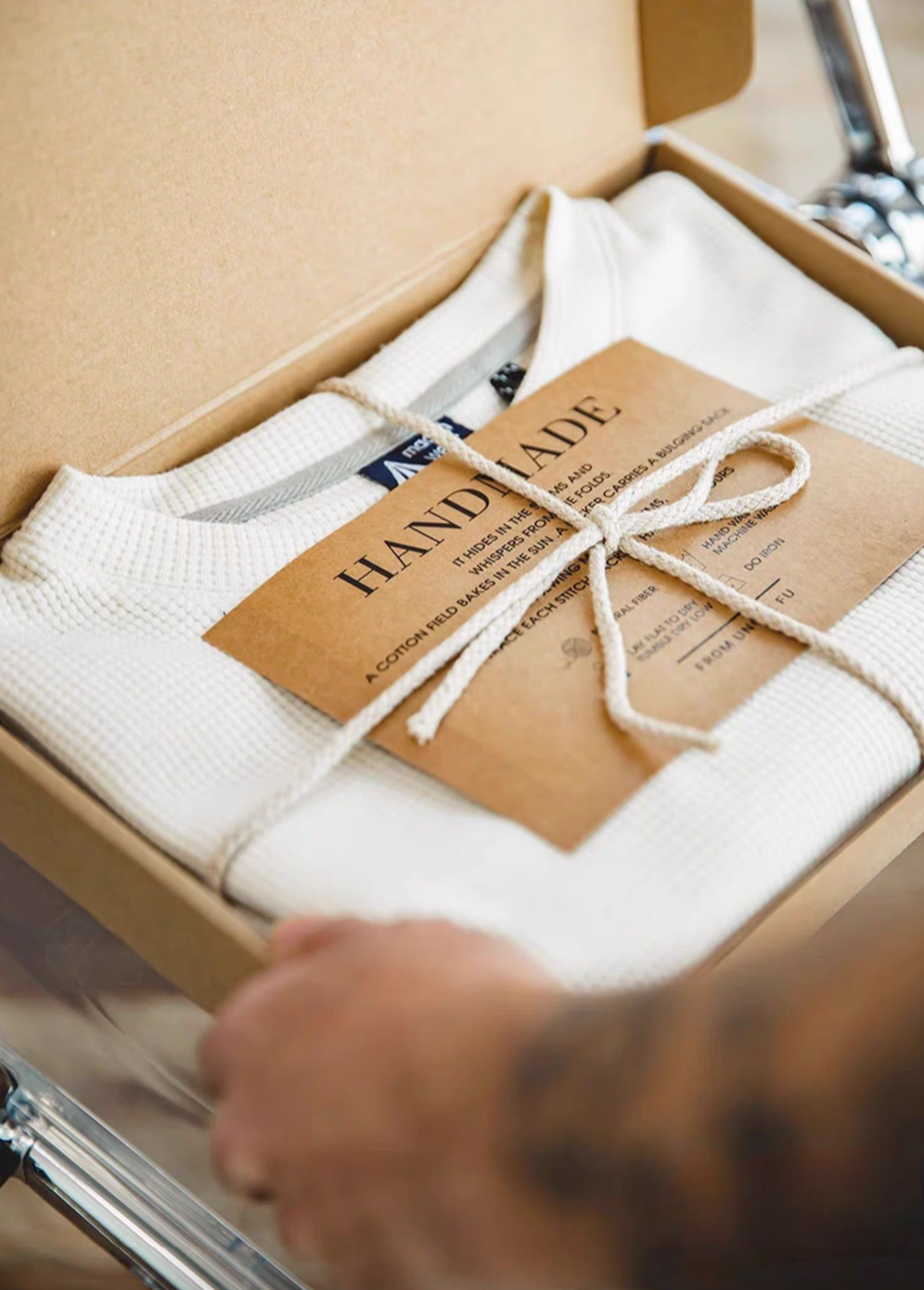 Waffle Knit Heavyweight T-Shirt beige color folded in box with handmade tag packaging close-up
