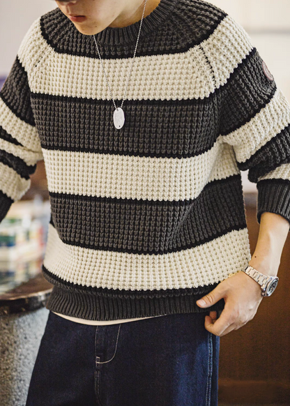 Waffle Ridge Stripe Sweater in Brownish-white worn by model showing bold contrast stripes waffle knit texture and relaxed comfortable fit
