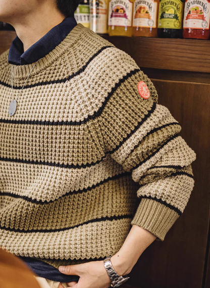 Waffle Ridge Stripe Sweater Khaki sleeve detail featuring textured waffle knit stripes and signature patch accent for a unique casual look