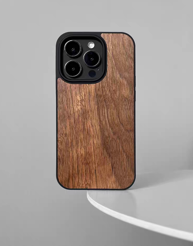 Natural walnut wood MagSafe phone case back view with smooth wood grain texture and black frame