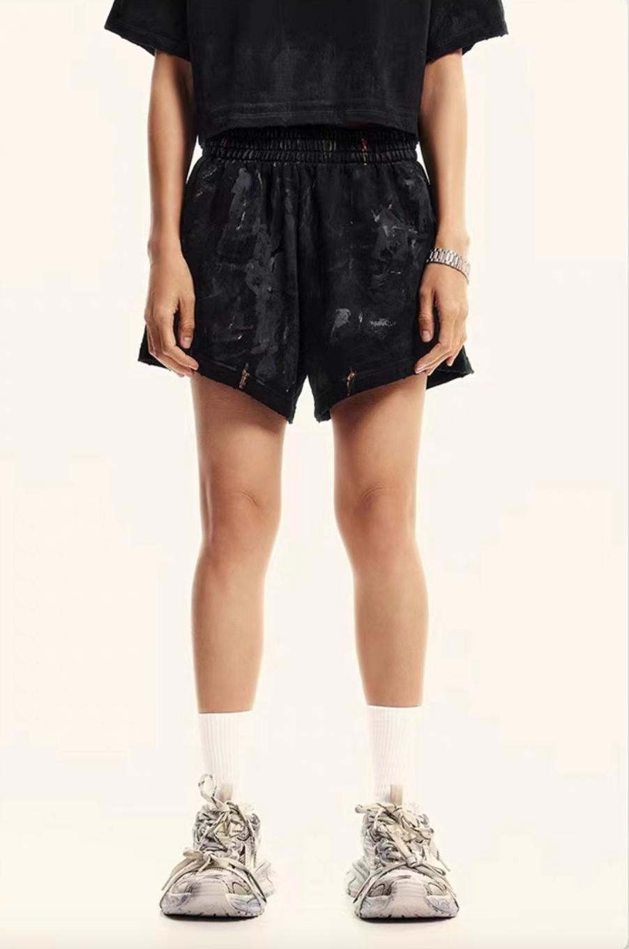 Black washed lounge shorts front close-up on model elastic waist relaxed fit
