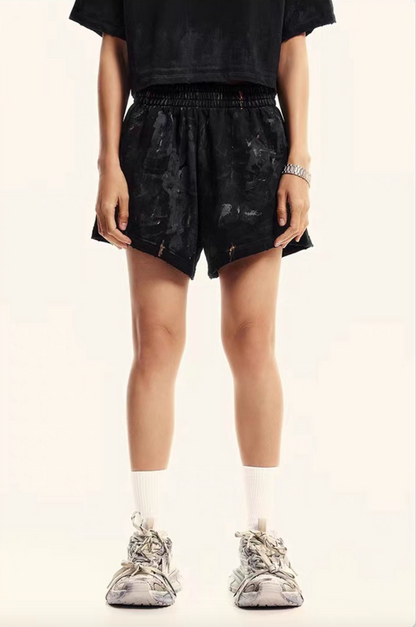 Black washed lounge shorts front close-up on model elastic waist relaxed fit