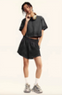 Washed Cropped Tee with Relaxed Low-Rise Lounge Shorts Set in charcoal gray, full outfit front view on model