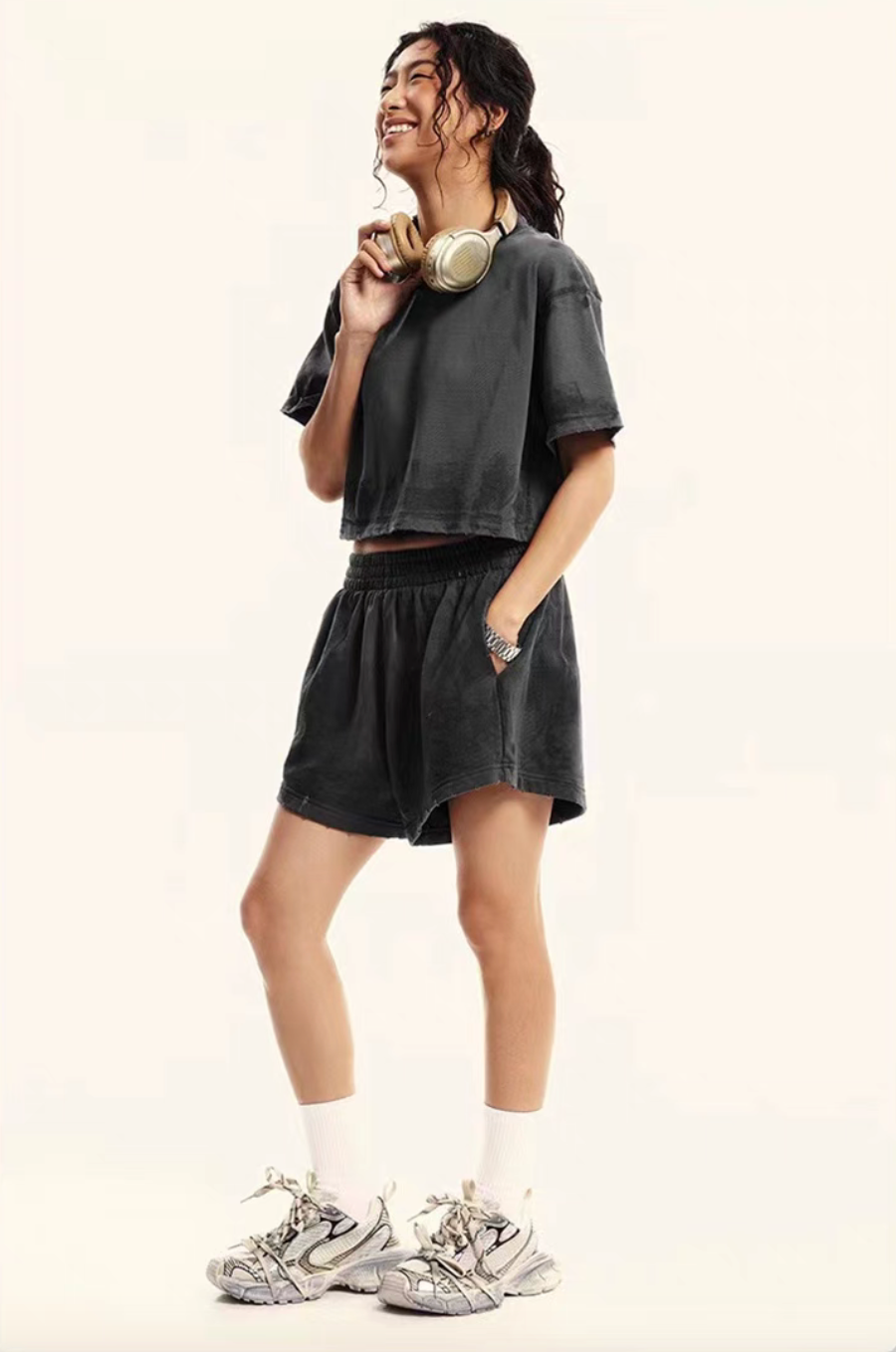 Charcoal gray washed cropped tee and lounge shorts set side view on model casual outfit