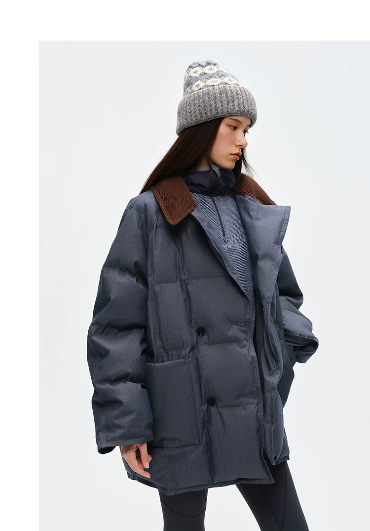 Slate blue washed denim down peacoat with brown corduroy collar, worn open, angled front view
