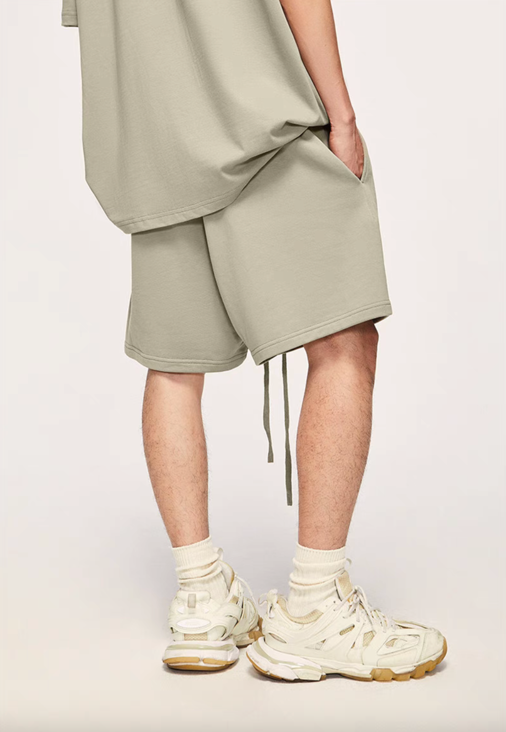 Washed Heavyweight Terry Shorts Sand back view worn showing loose silhouette and mid-length cut