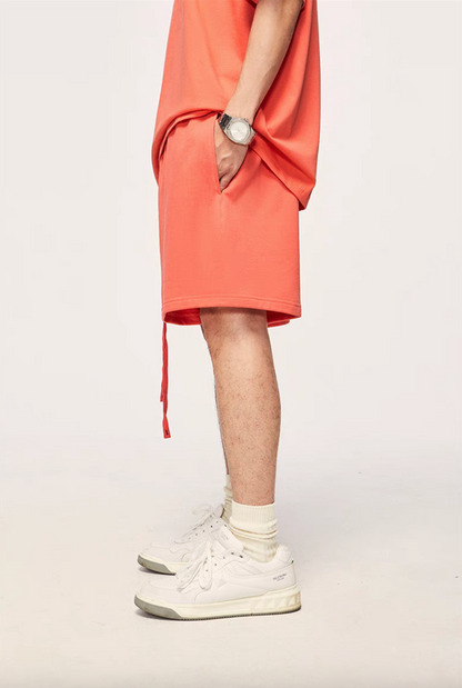 Washed Heavyweight Terry Shorts Watermelon Red side wear view showing relaxed fit and mid-length cut