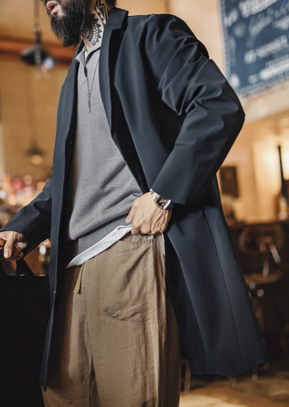 Men’s navy waterproof Mac coat styled for city commute