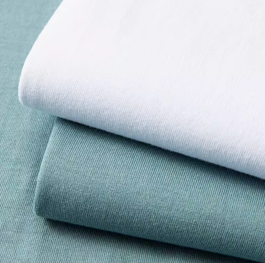 Weekend Vibes Tee ocean blue and white fabric close-up showing smooth cotton texture