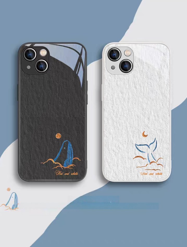 Whale phone case dual display showing whale head with black frame and whale tail with white frame design