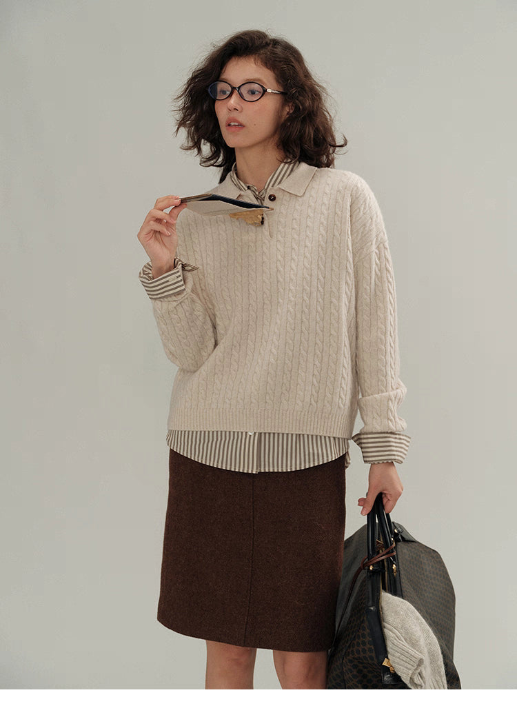 Full outfit with beige wool cable-knit polo sweater layered over striped shirt and brown skirt