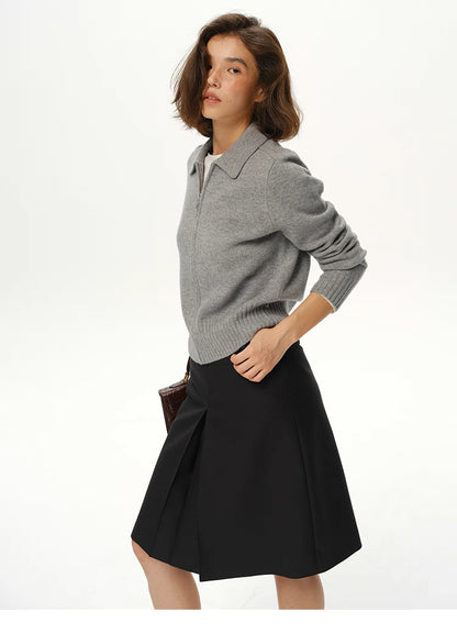 Side view of medium grey wool zip-up sweater jacket showing relaxed fit and drape