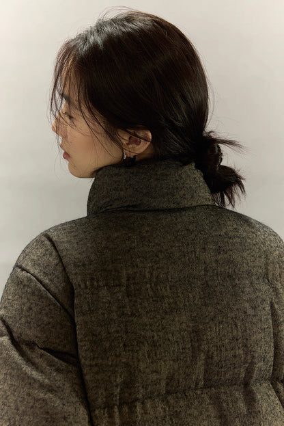 Close-up of back collar and wool-blend texture on down jacket.