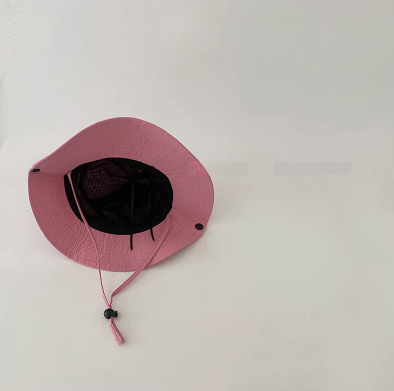 Interior view of pink youth outdoor quick dry sun hat showing breathable lining and strap